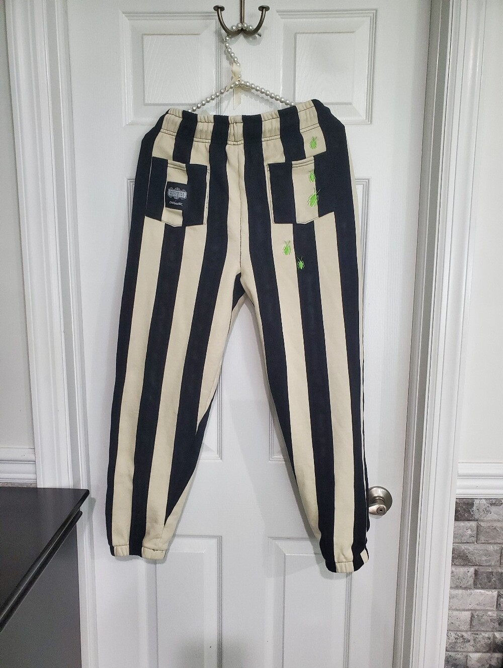 Cakeworthy Beetlejuice Striped Black & Cream Joggers with Neon Green Embroidery